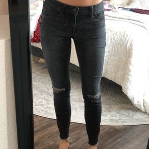 Black jeans, cut outs on the knees